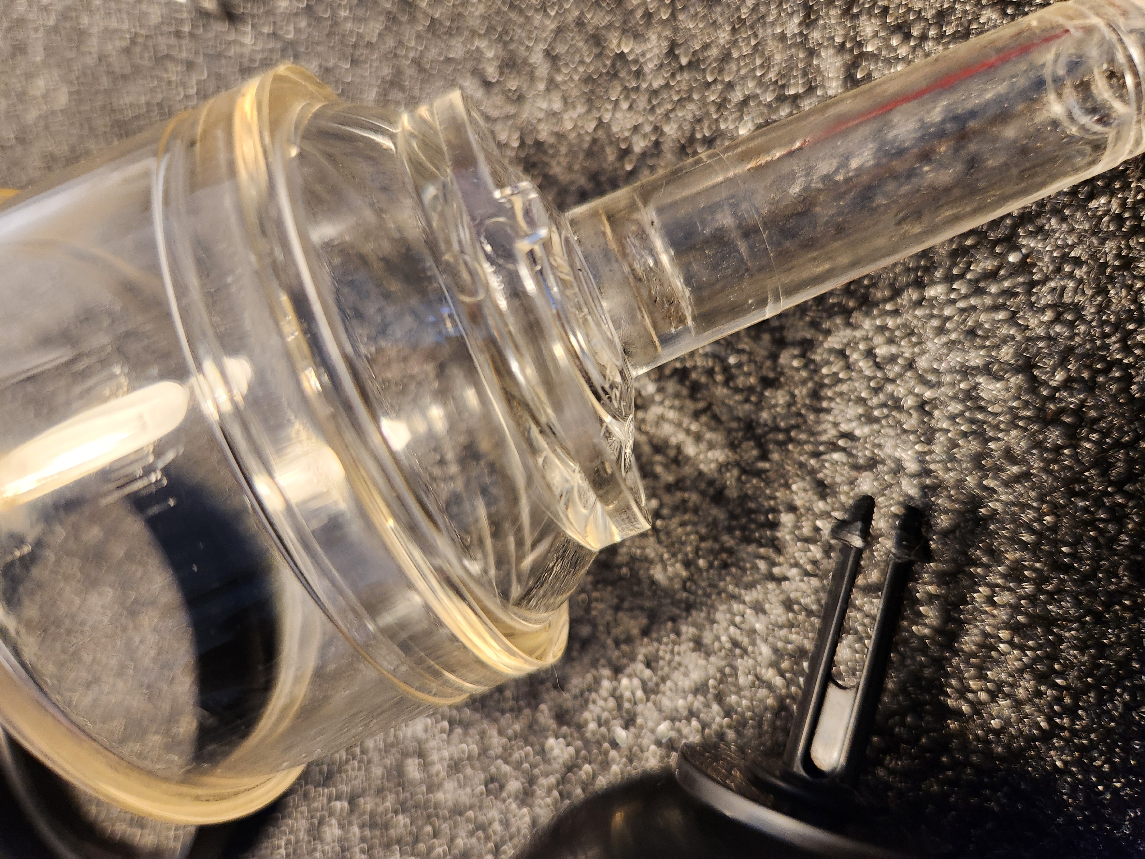 Black clip to squeeze through cup